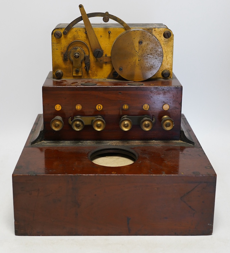 A late 19th century brass and mahogany Wheatstone type telegraph receiver (Morse inker), containing two drawers with paper rolls, 30cm high, 30cm wide, 28cm deep.